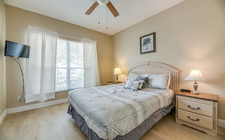 Master bedroom #2 with a queen bed Master bedroom #2 with a queen bed