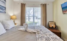 Queen bedroom located on second floor Queen bedroom located on second floor