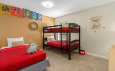 Bedroom #5 with a twin/twin bunk bed and a twin bed Bedroom #5 with a twin/twin bunk bed and a twin bed