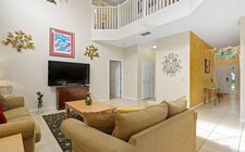 Family room leading to pool area Family room leading to pool area