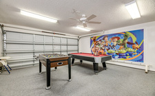 Game-room with pool table and foosball table Game-room with pool table and foosball table