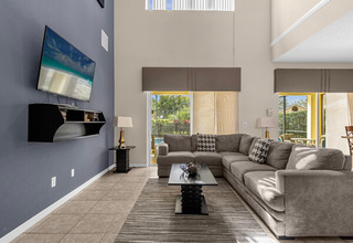 Large family room leading to the pool area Large family room leading to the pool area
