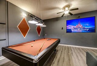 It is not a garage, but a game-room It is not a garage, but a game-room