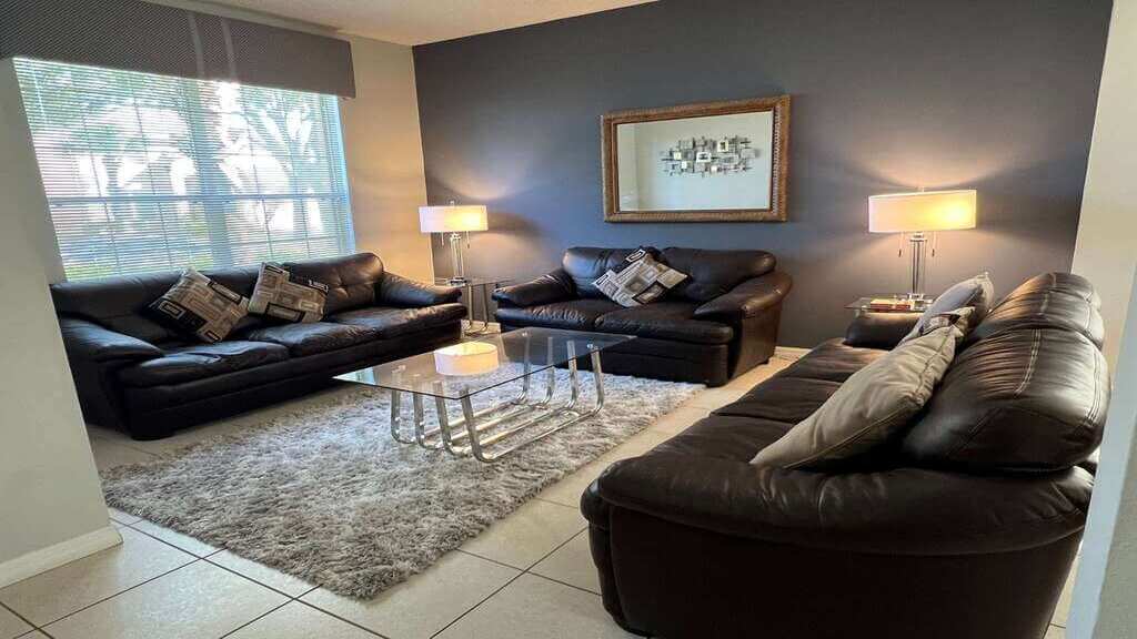 This spacious living room offers comfortable furniture