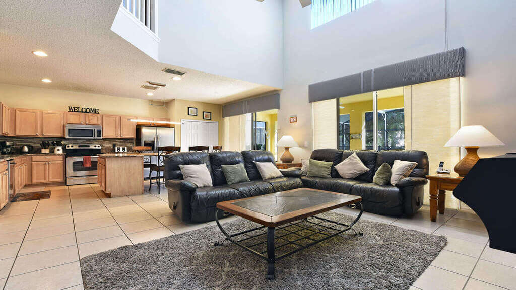 Family room offers comfortable leather seating