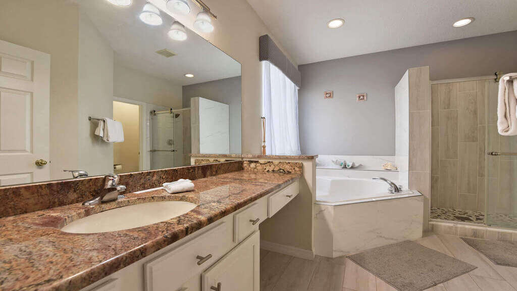 First floor master bath - Tub, dual sinks, toilet and shower