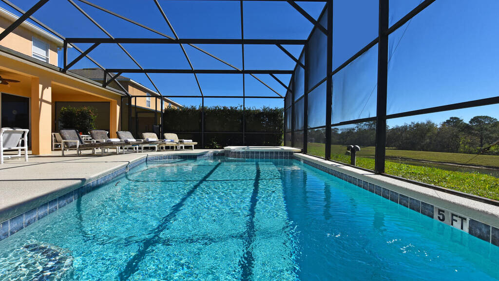 View of pool, spa and lanai