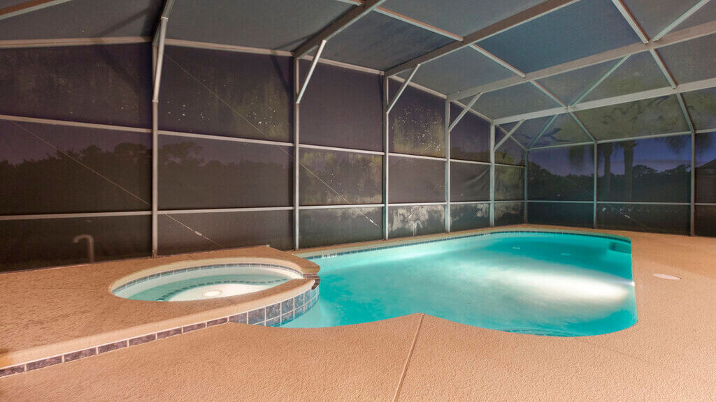 Emerald Island Rental: Night view of pool and spa