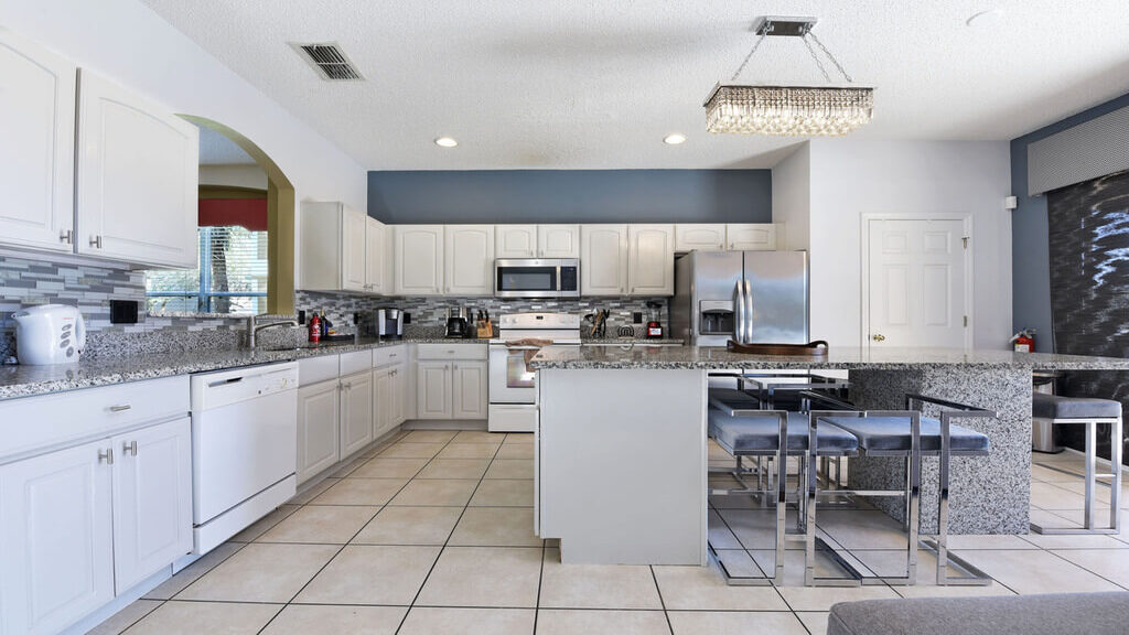 Kitchen with huge sit-in granite dining area