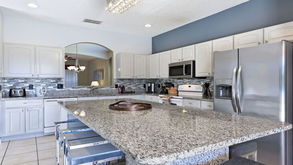 Kitchen with huge sit-in granite dining area