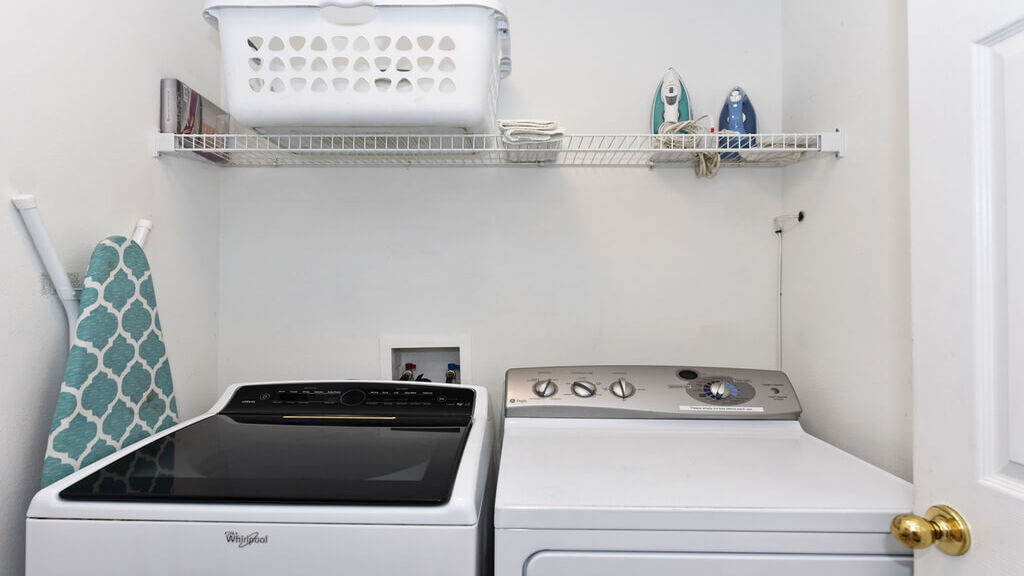 Laundry room with full size washer and dryer
