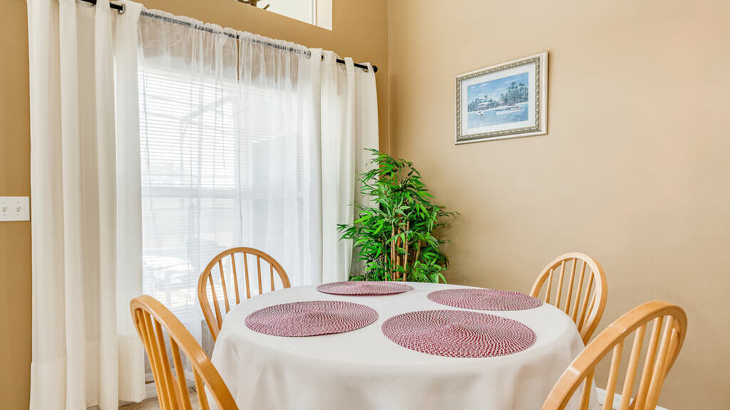 Sit and eat a wonderful family dinner together at this dining table