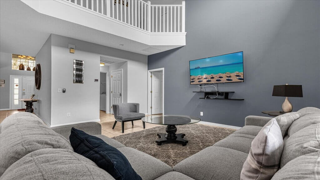 Spacious family room leading to the pool