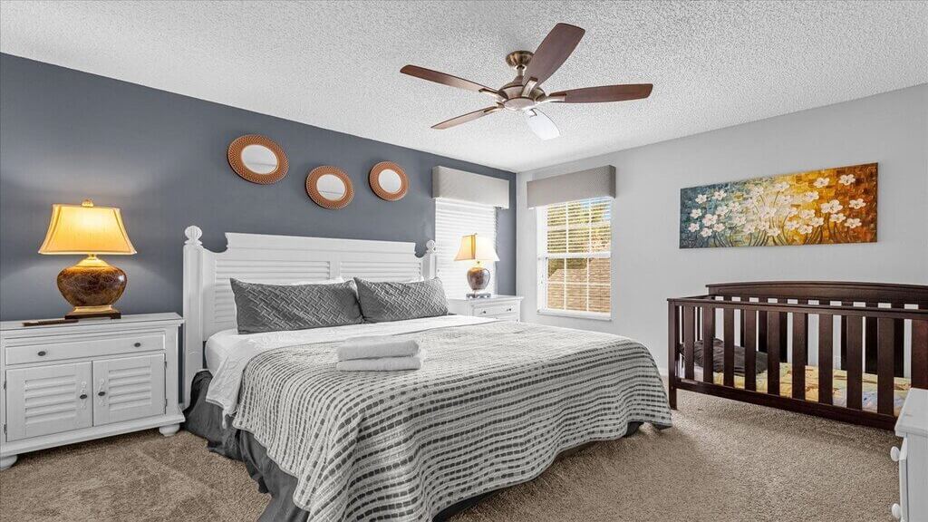 Bedroom #2: King bed, first floor and with a crib