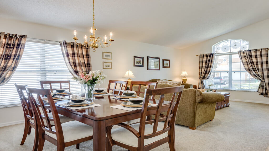 View of formal dining area and living area