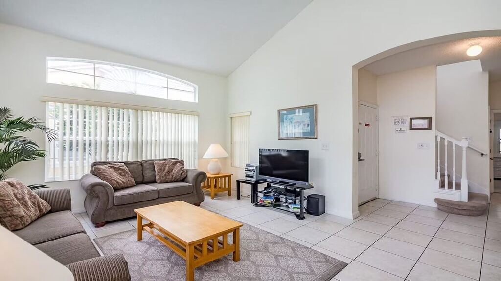 Living area with comfortable furnture and flat-screen TV