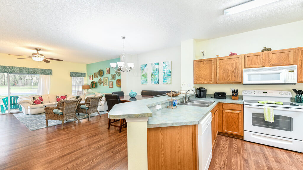 View of living, dining and kitchen