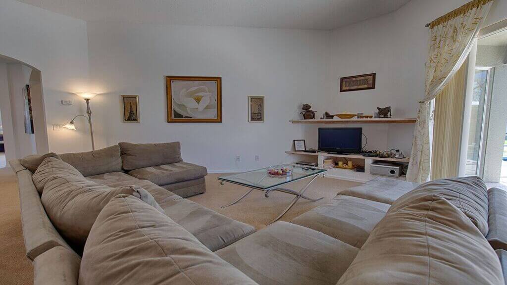 The family room has a flat-screen TV as well