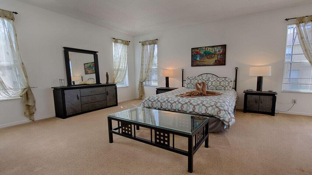 Master suite #1 has queen king bed and an attached bathroom