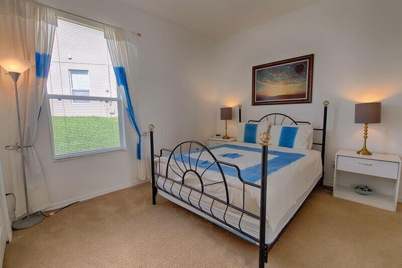 Master suite #2 has a queen bed and an attached bathroom