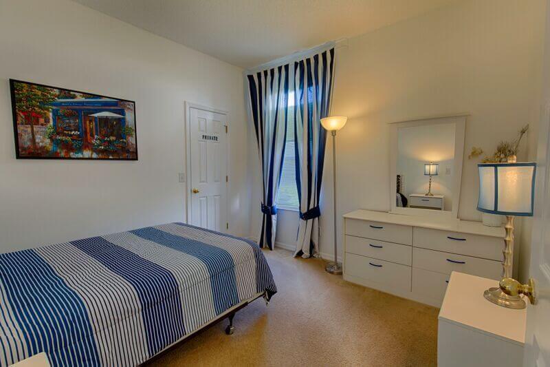 Bedroom #5 has a queen-size bed and comfortable furniture