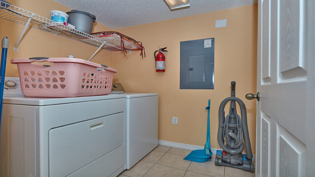 Laundry room with full-size washer and dryer