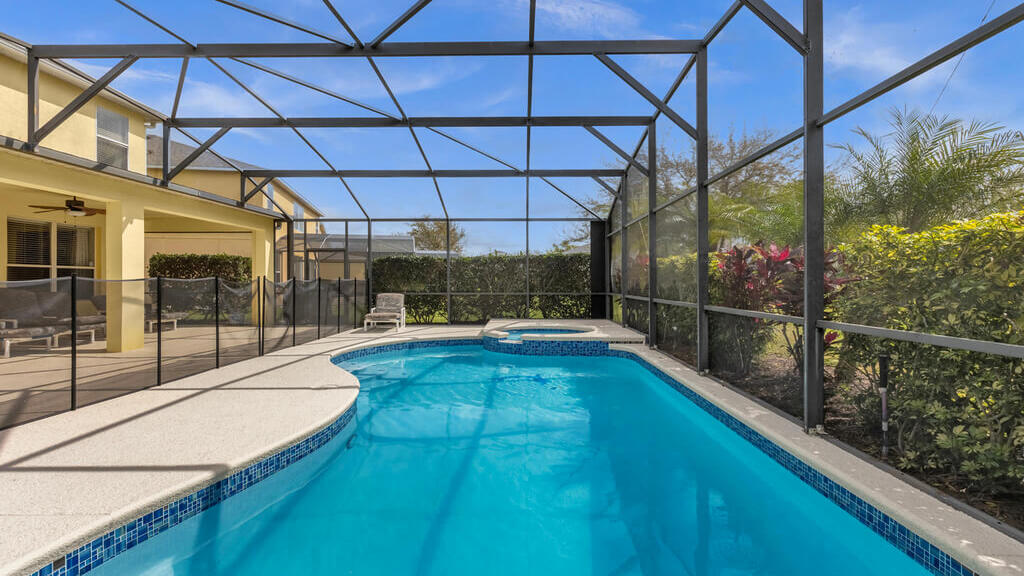 Imagine yourself sipping your favorite beverage while the kids splash in the pool