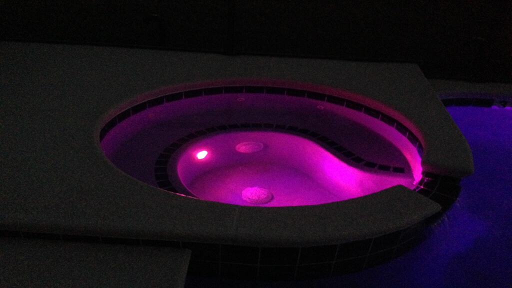 Pool at night with color changing lights